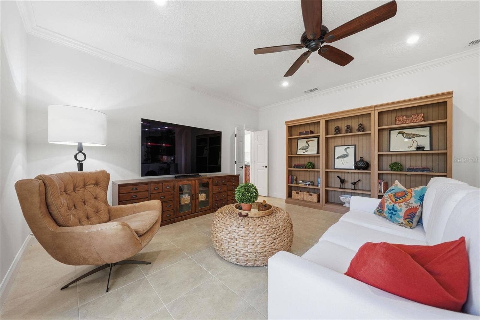 GENEROUS SIZED FAMILY ROOM WITH DOORS CLOSING OFF THE 4TH BEDROOM AND 3RD BATH FOR PRIVACY