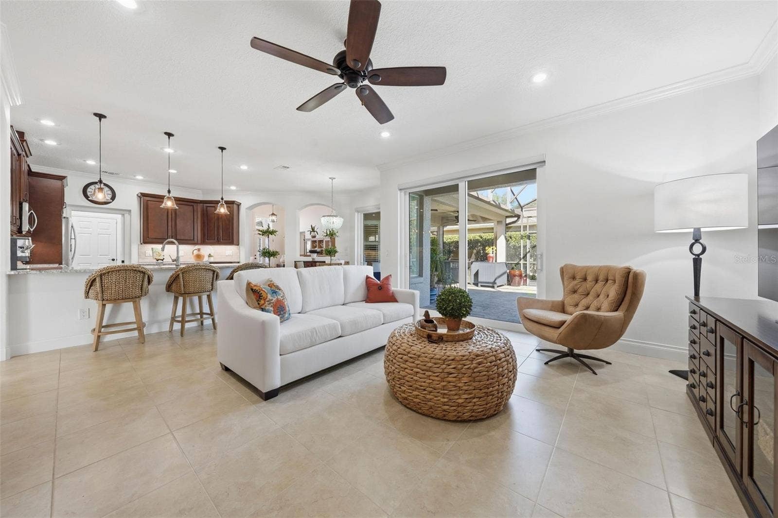 FAMILY ROOM WITH NEW SLIDING DOORS WITH MOTORIZED BLINDS