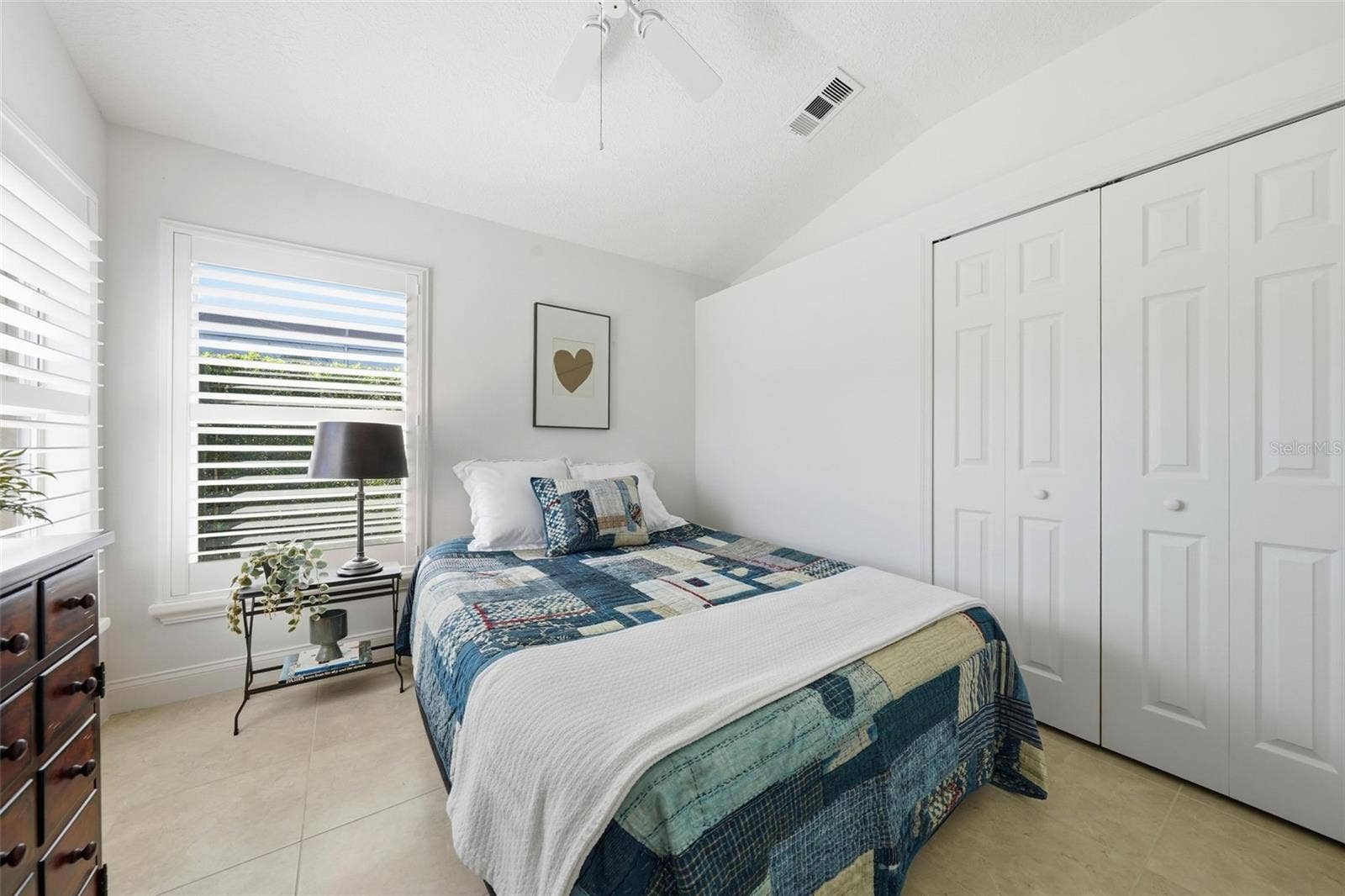 BEDROOM ACROSS FROM THE 3RD FULL BATHROOM (ALSO THE POOL BATH)
