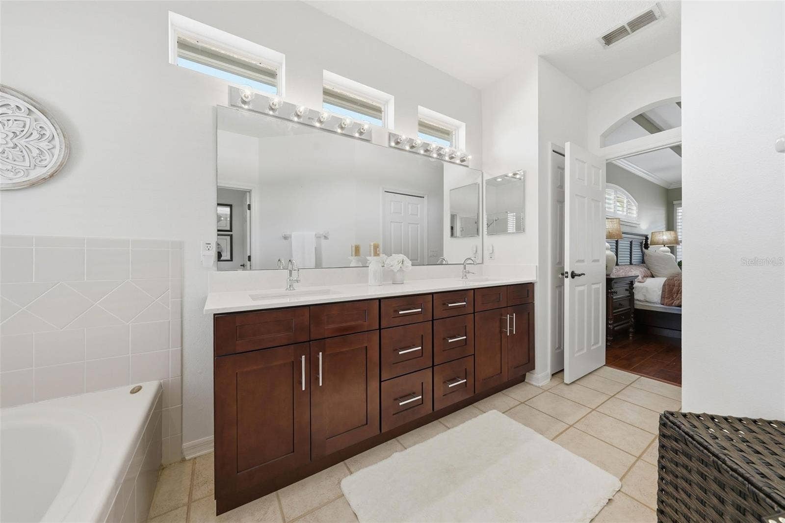LARGE PRIMARY BATHROOM WITH LOTS OF STORAGE