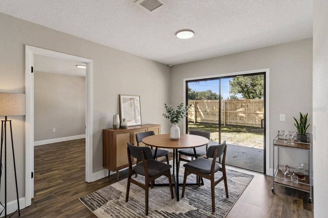 Virtually stages Dining Room