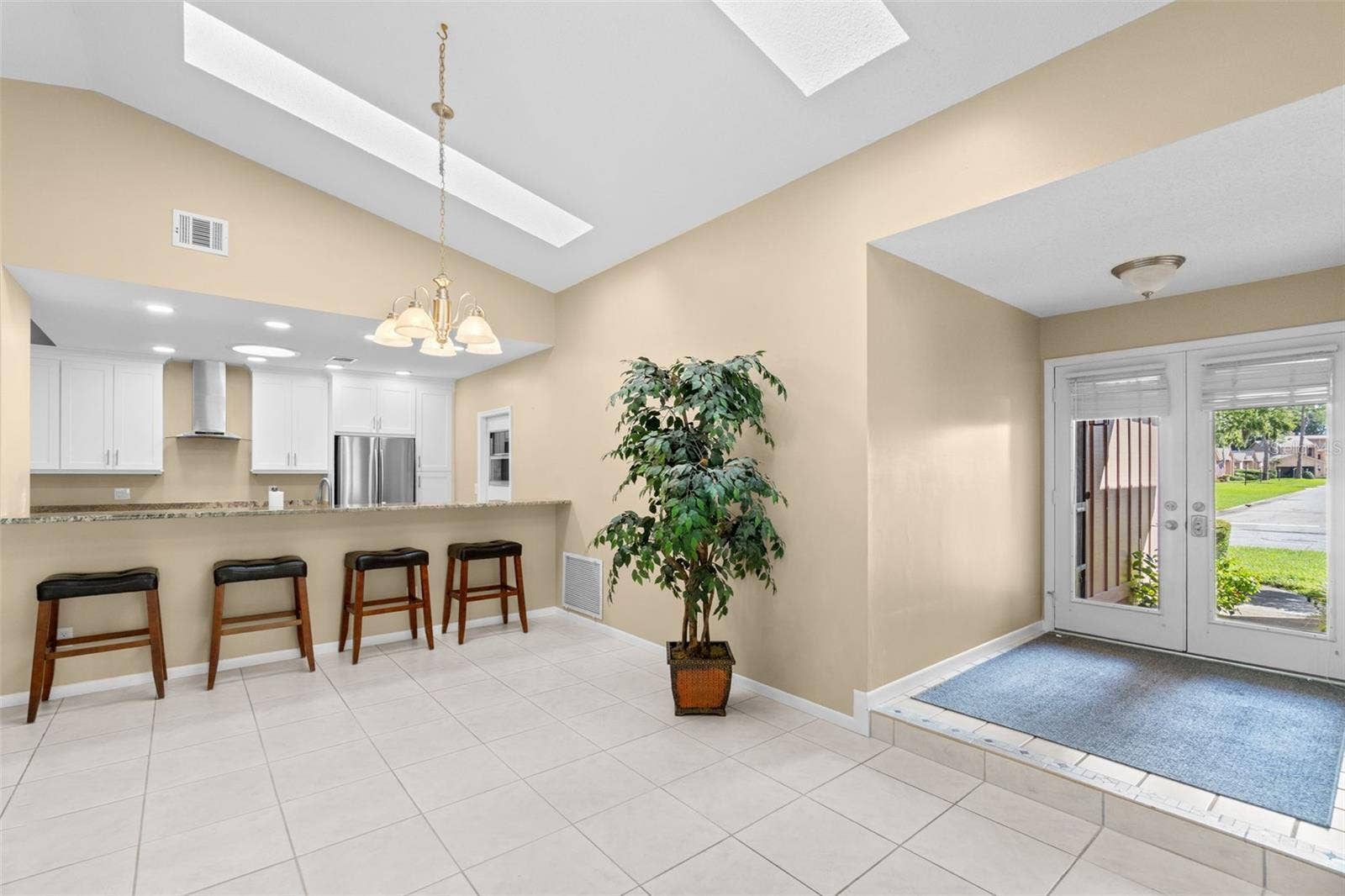 Entrance to living/dining room and kitchen bar