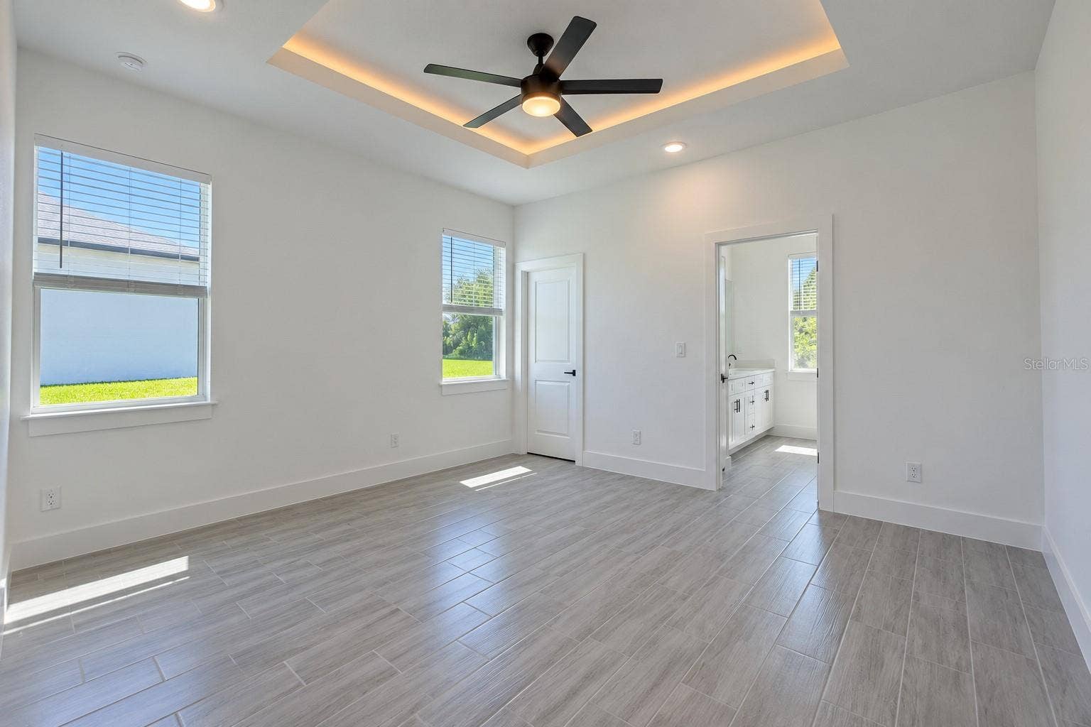 24479 SW KINGSWAY CIRCLE, Arcadia, FL 34269 Primary bedroom. Digitally edited model/property composite.