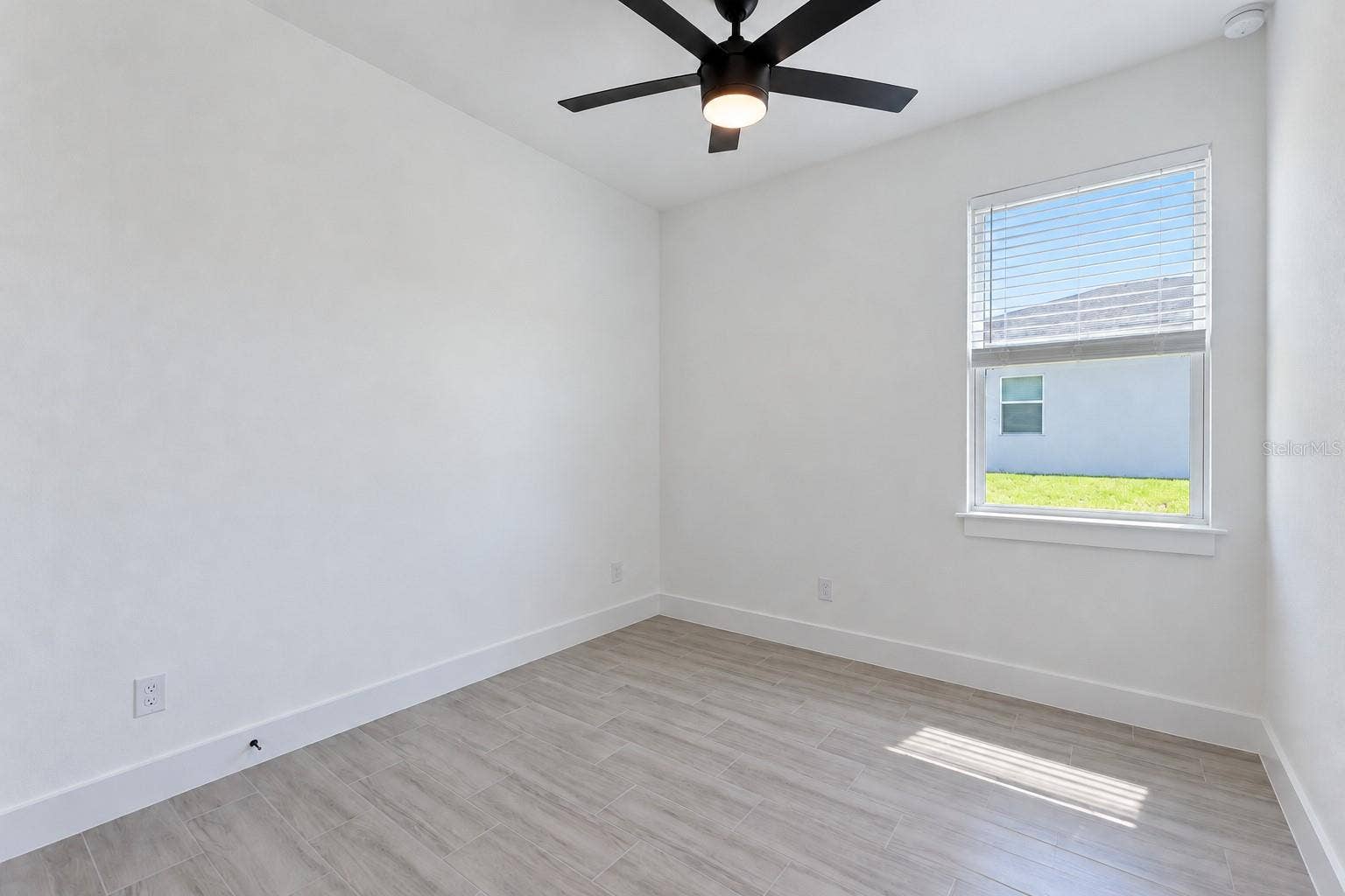 24479 SW KINGSWAY CIRCLE, Arcadia, FL 34269 Bedroom three. Digitally edited model/property composite.
