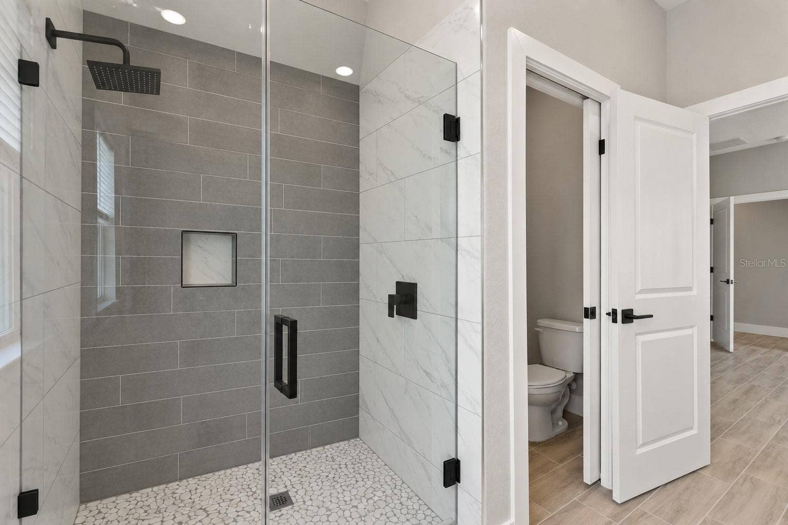 24479 SW KINGSWAY CIRCLE, Arcadia, FL 34269 Primary shower. Digitally edited model/property composite.