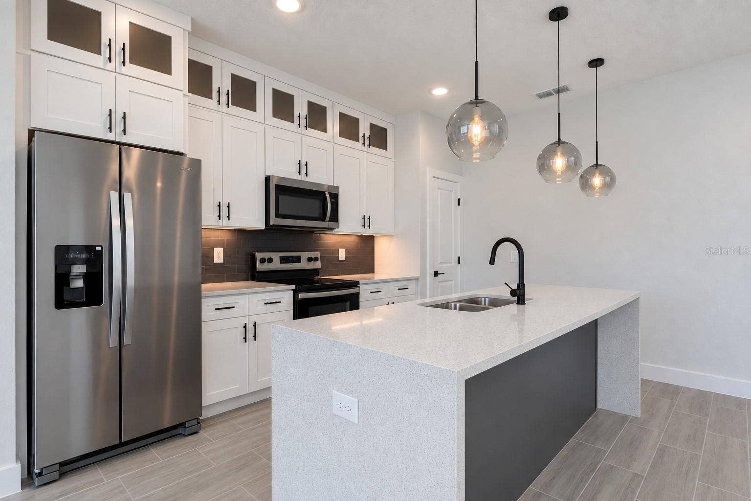 24479 SW KINGSWAY CIRCLE, Arcadia, FL 34269 Kitchen. Digitally edited model/property composite.