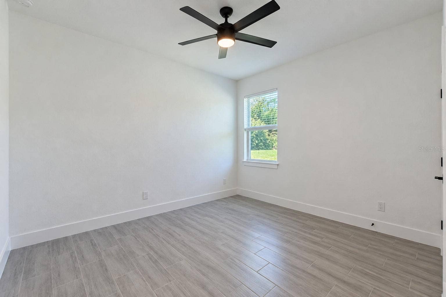 24479 SW KINGSWAY CIRCLE, Arcadia, FL 34269 Bedroom two. Digitally edited model/property composite.