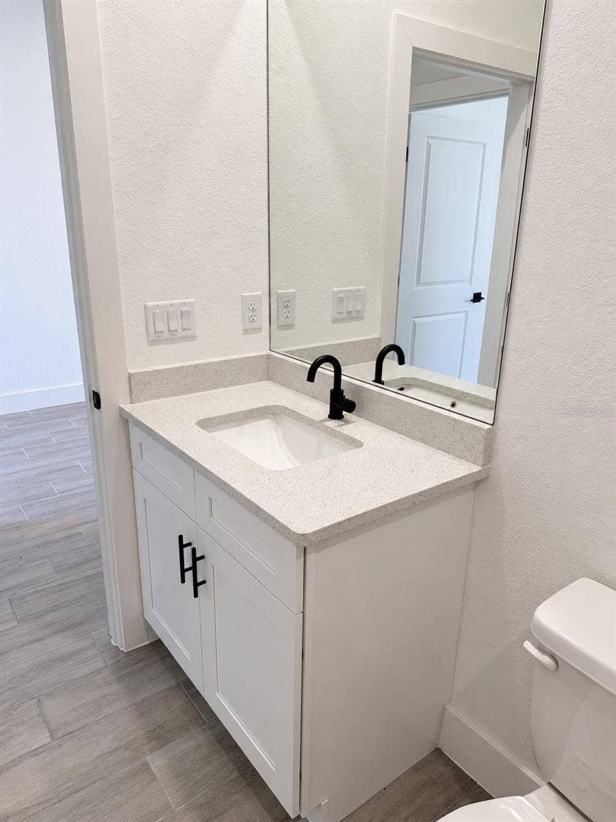 24479 SW KINGSWAY CIRCLE, Arcadia, FL 34269 Guest vanity detail. Actual property photo, digitally refined.