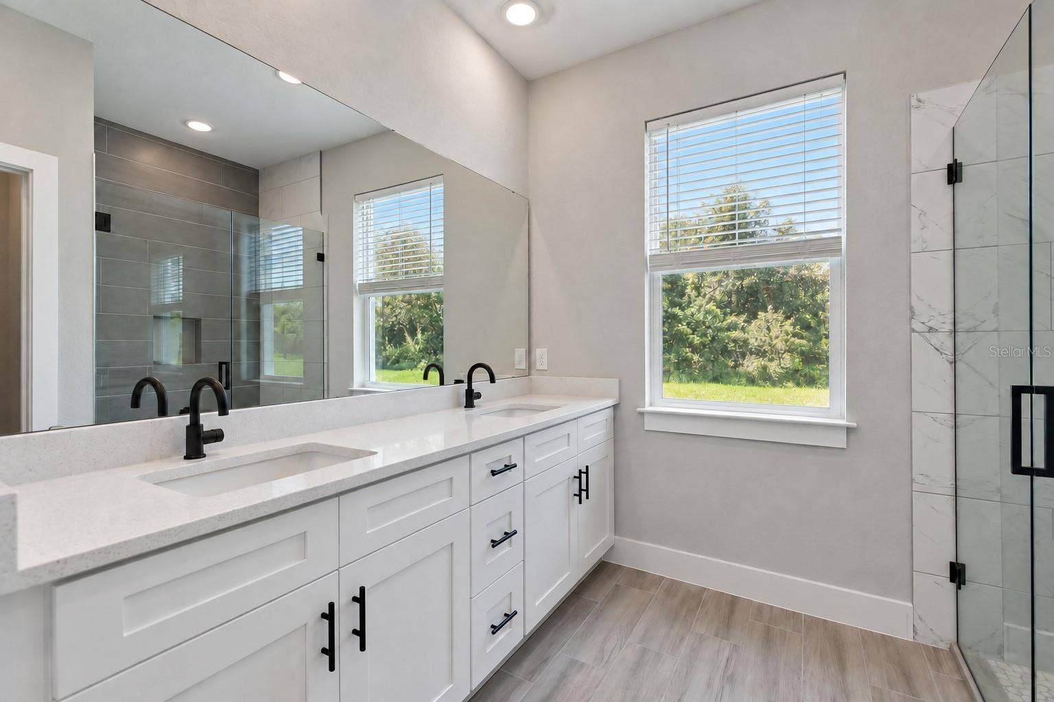 24479 SW KINGSWAY CIRCLE, Arcadia, FL 34269 Primary bathroom. Digitally edited model/property composite.