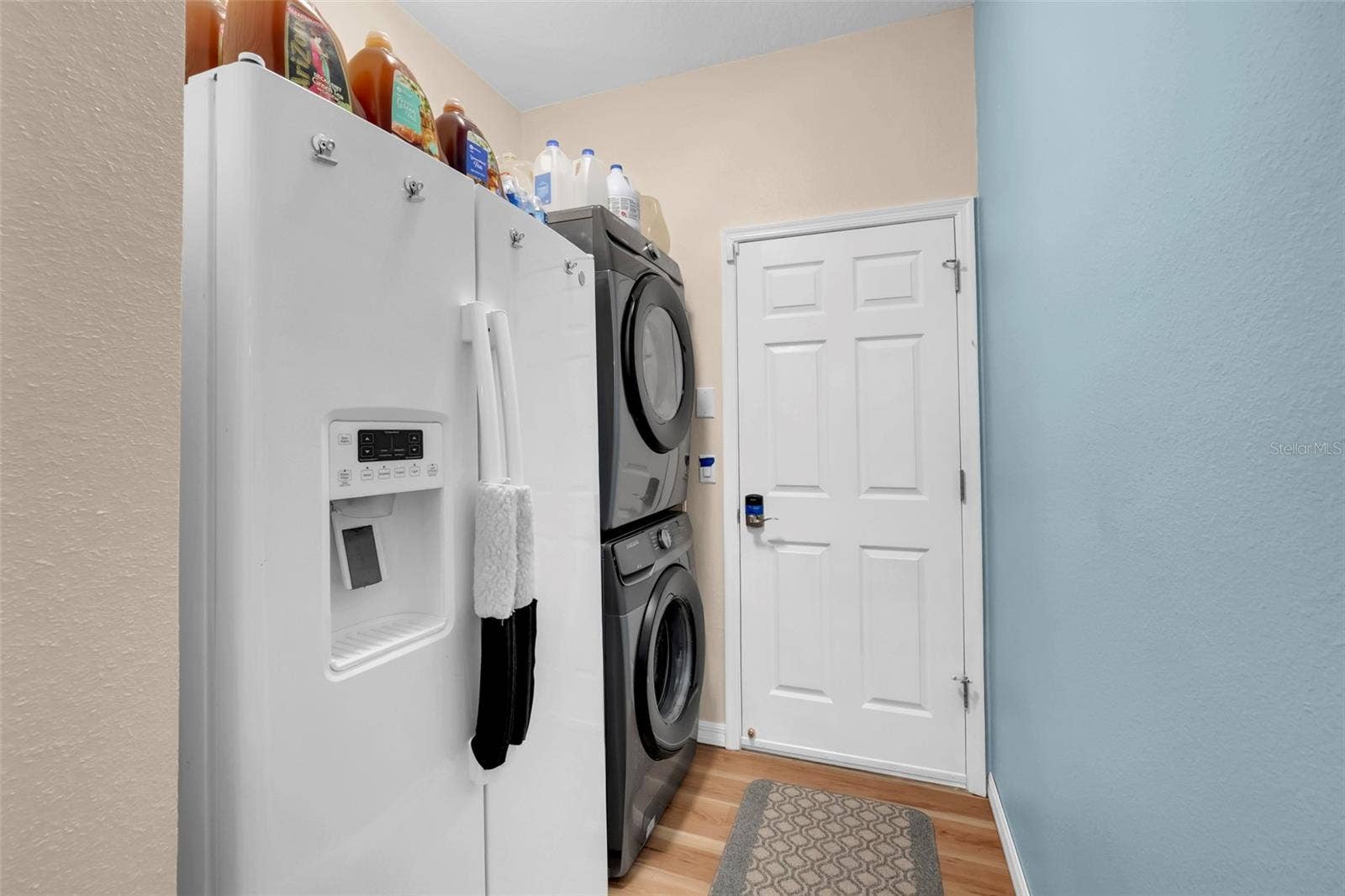 4377 SAMBOURNE STREET, Clermont, FL 34711 Laundry Room with Washer, Dryer & 2nd Fridge