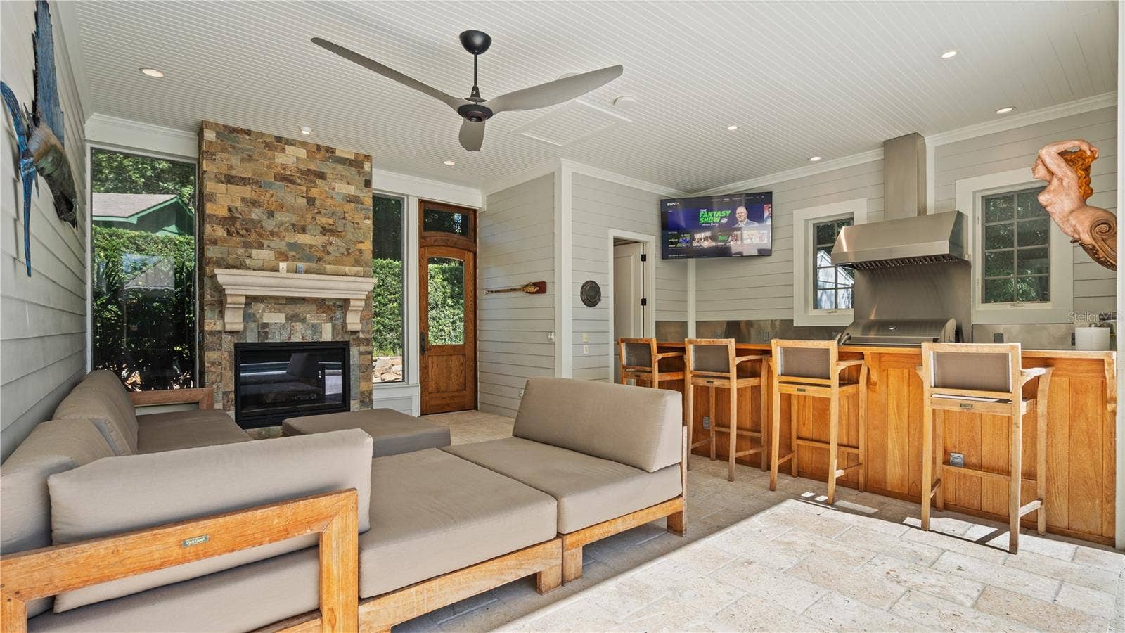 651 OLD EUSTIS ROAD, Mount Dora, FL 32757 Covered Space with electric roll down screens