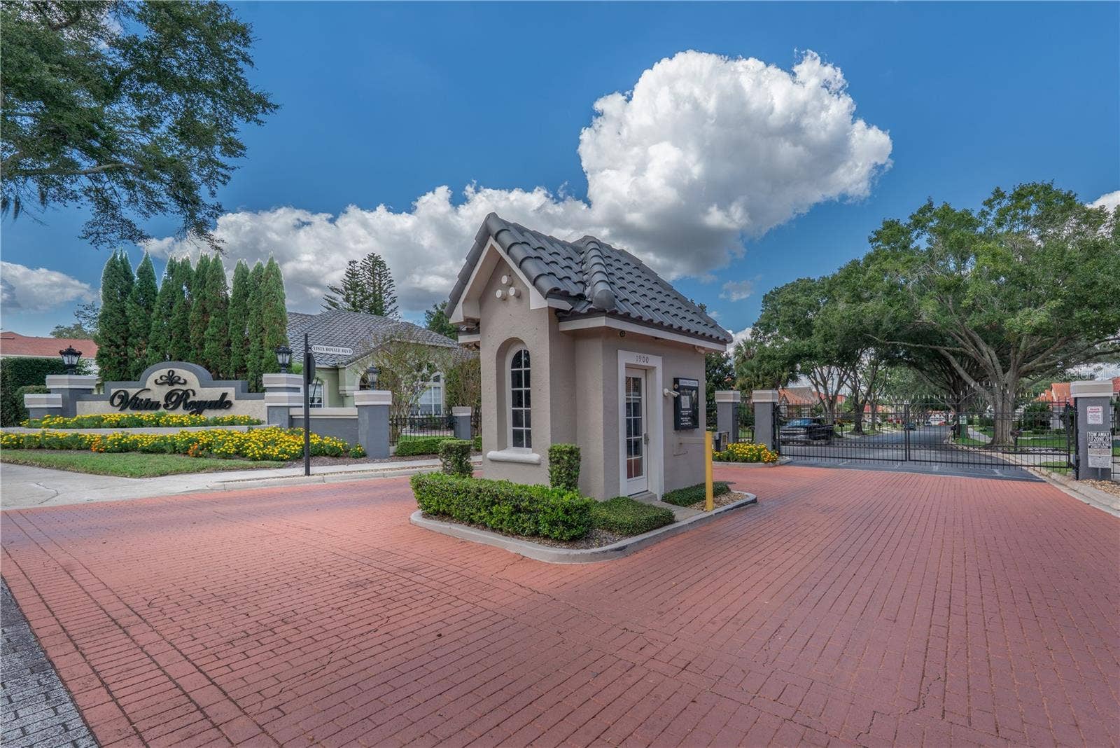 1854 VISTA ROYALE BOULEVARD, Orlando, FL 32835 Gated entrance providing private access and enhanced security.