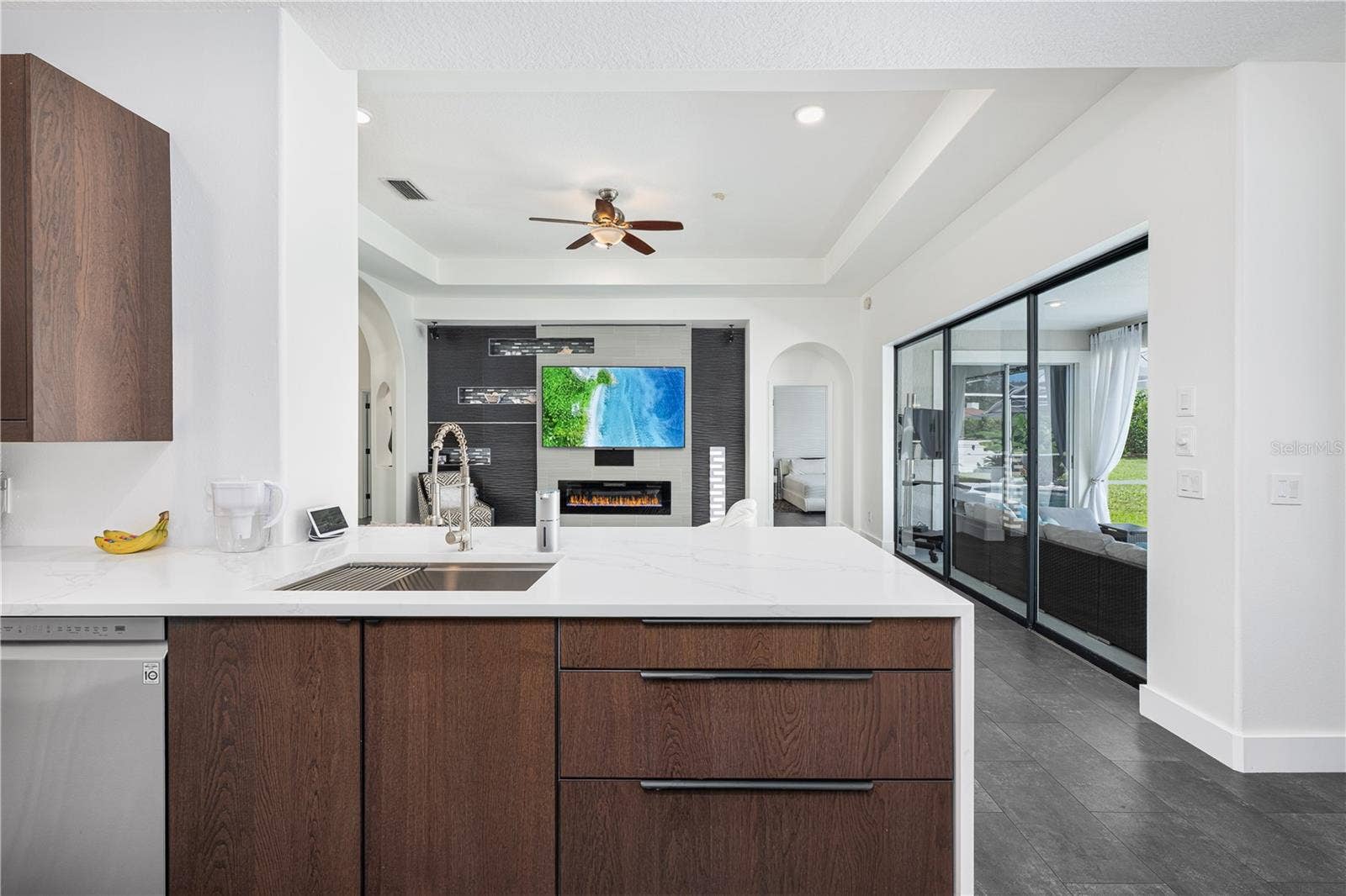 1854 VISTA ROYALE BOULEVARD, Orlando, FL 32835 Experience effortless entertaining with this home's spacious open-concept kitchen, perfect for hosting and staying connected with guests.