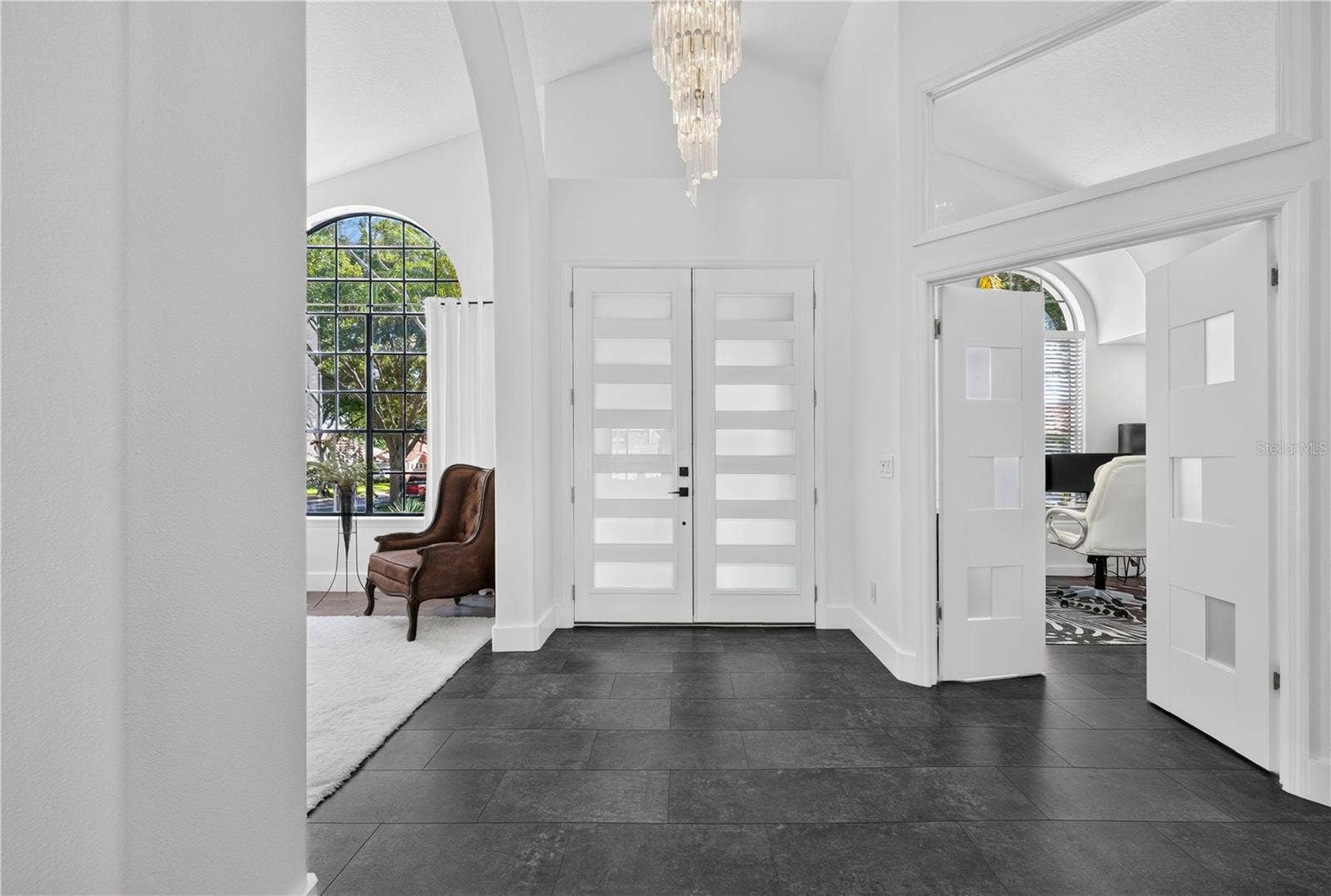 1854 VISTA ROYALE BOULEVARD, Orlando, FL 32835 Custom 8 foot doors welcome you!