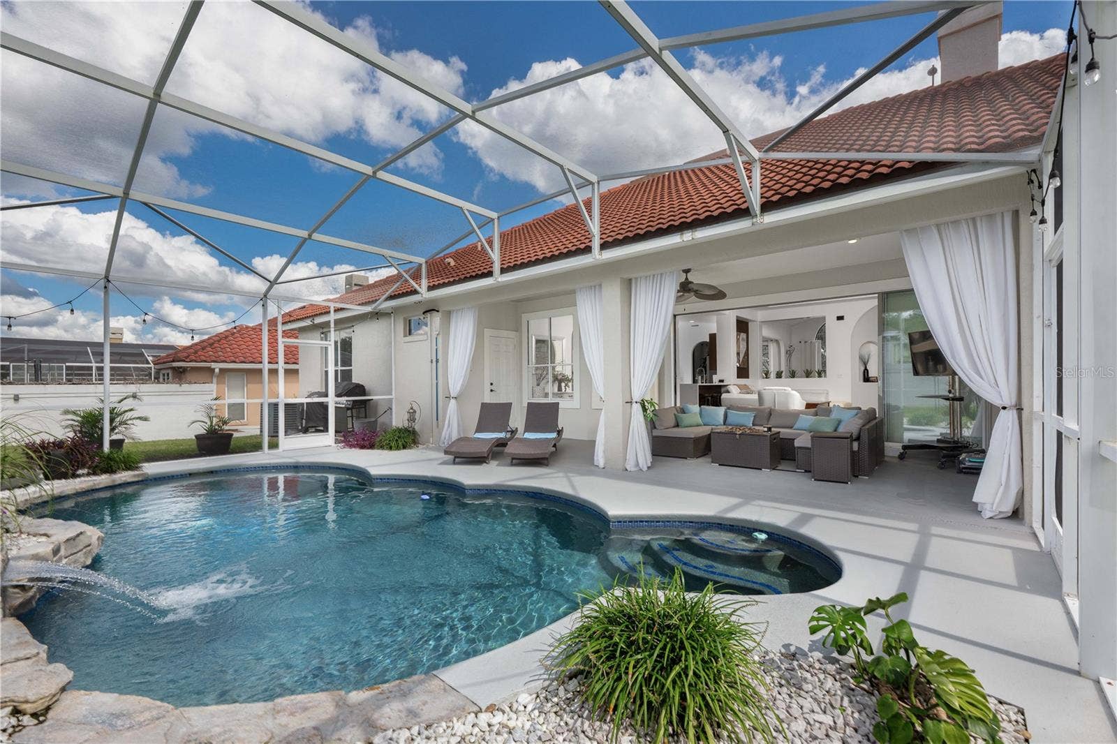 1854 VISTA ROYALE BOULEVARD, Orlando, FL 32835 Spacious backyard oasis featuring a relaxing salt pool.