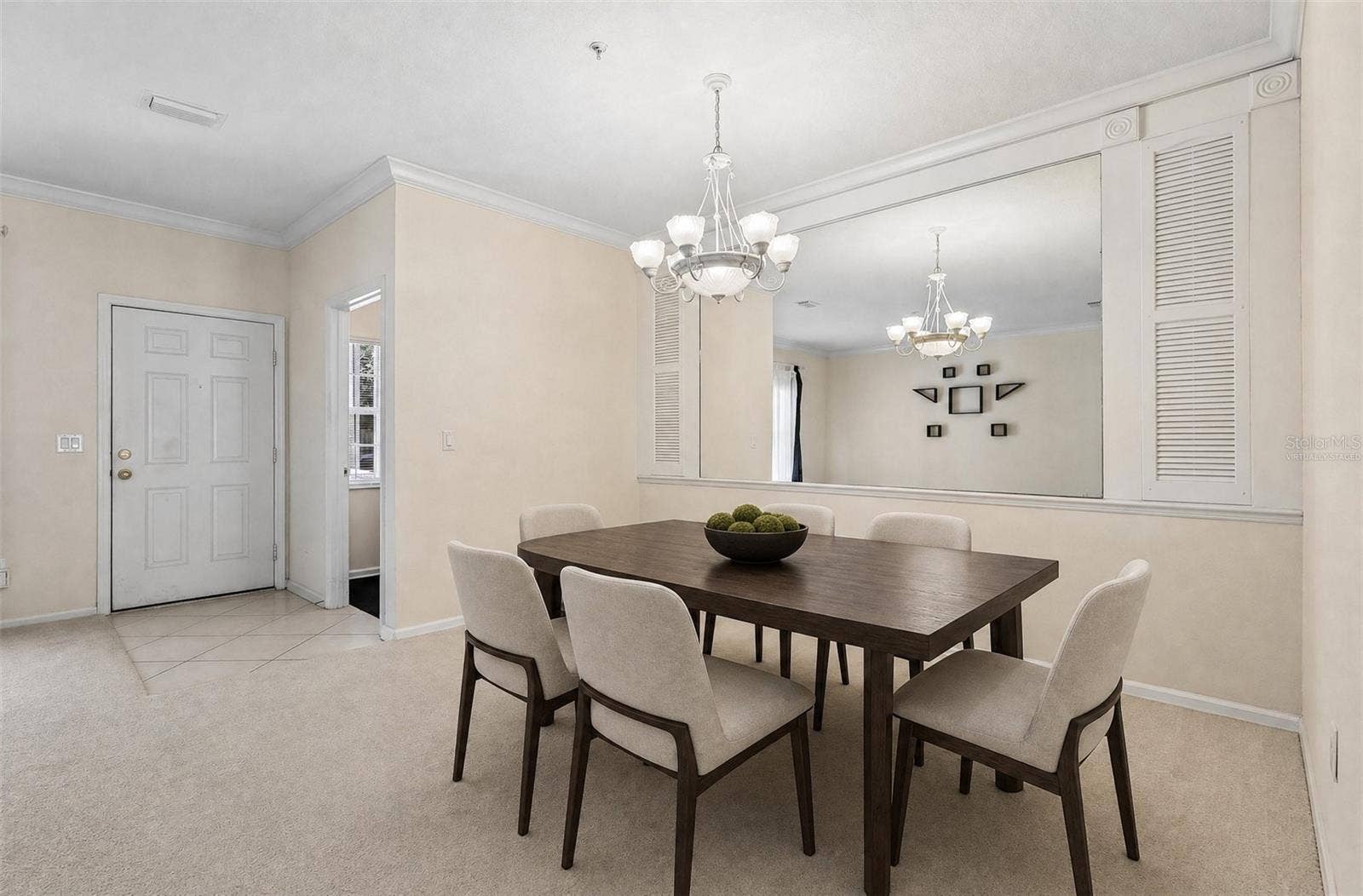 Formal dining at the front of the home. Virtually Staged.