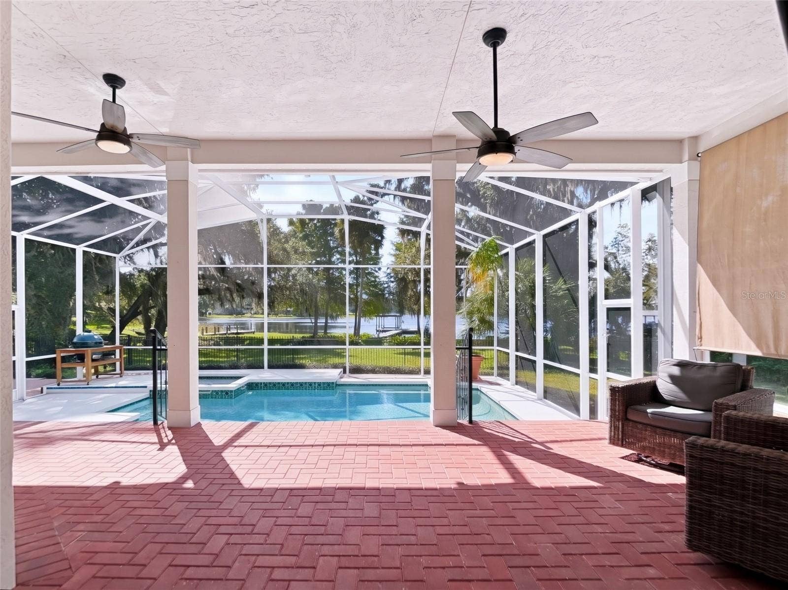 1128 OAKPOINT CIRCLE, Apopka, FL 32712 Elevated brick porch with pool and lake views