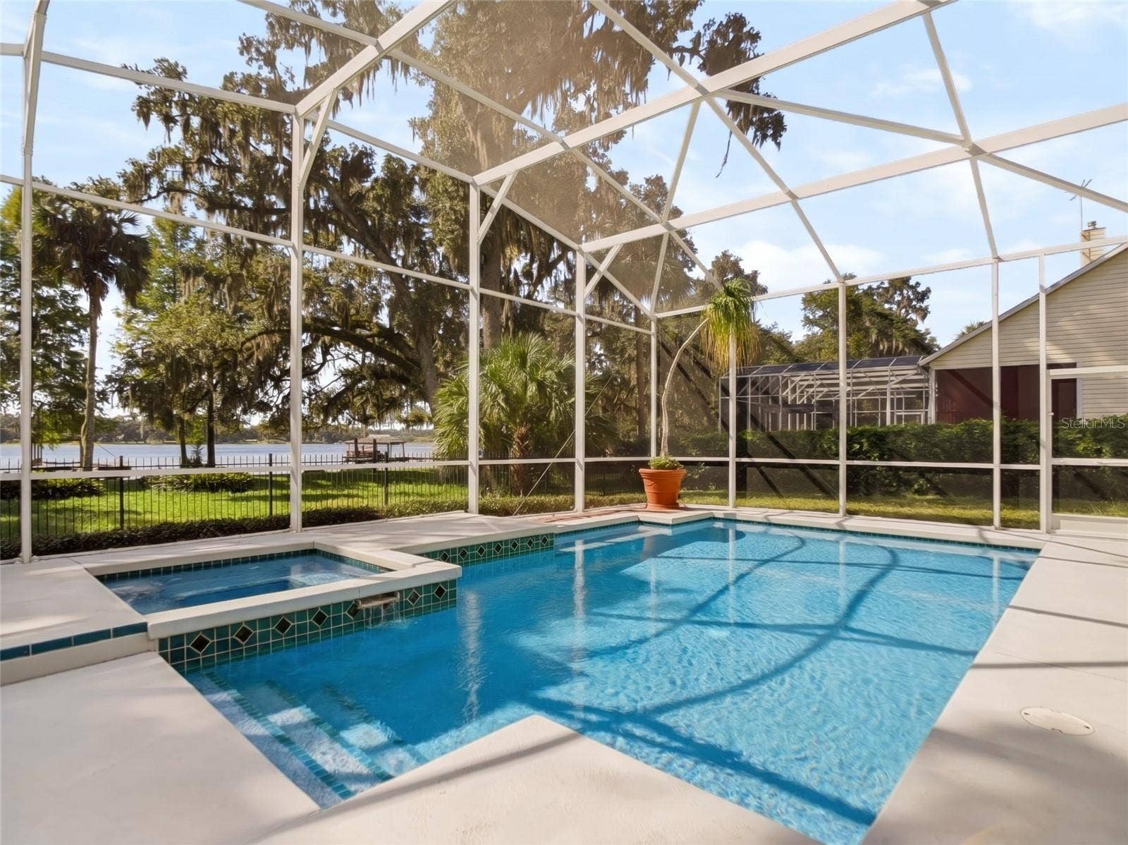 1128 OAKPOINT CIRCLE, Apopka, FL 32712 Heated pool and spa with enclosure
