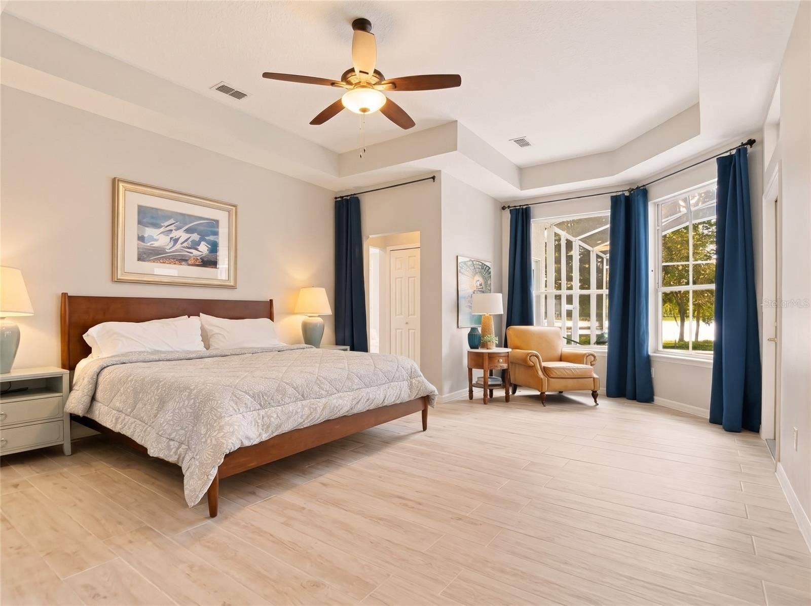 1128 OAKPOINT CIRCLE, Apopka, FL 32712 Primary bedroom with lake views