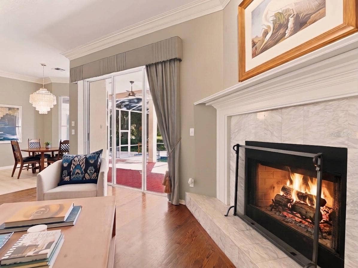 1128 OAKPOINT CIRCLE, Apopka, FL 32712 Cozy Living Room with lake views