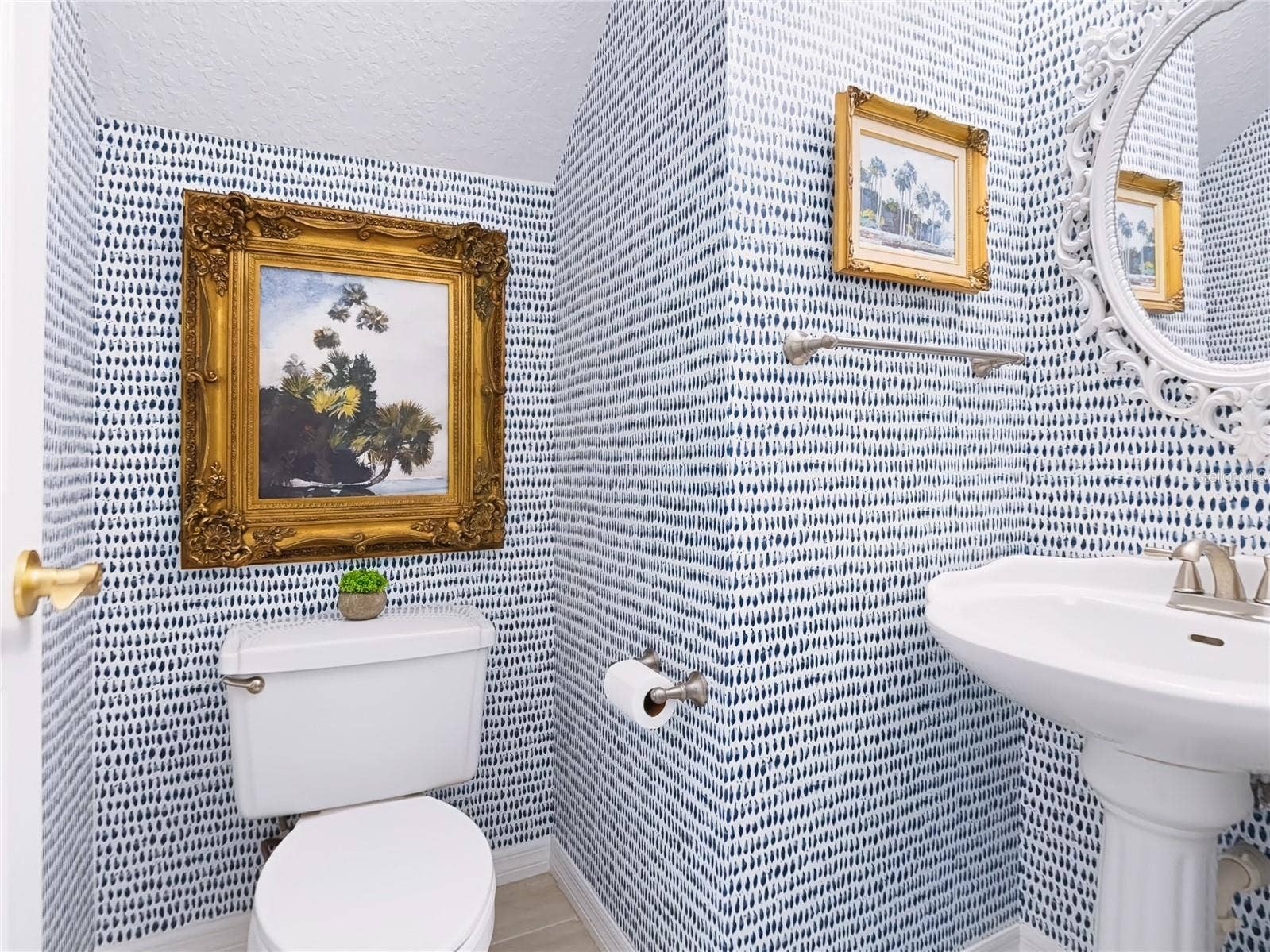 1128 OAKPOINT CIRCLE, Apopka, FL 32712 Half bath off hallway