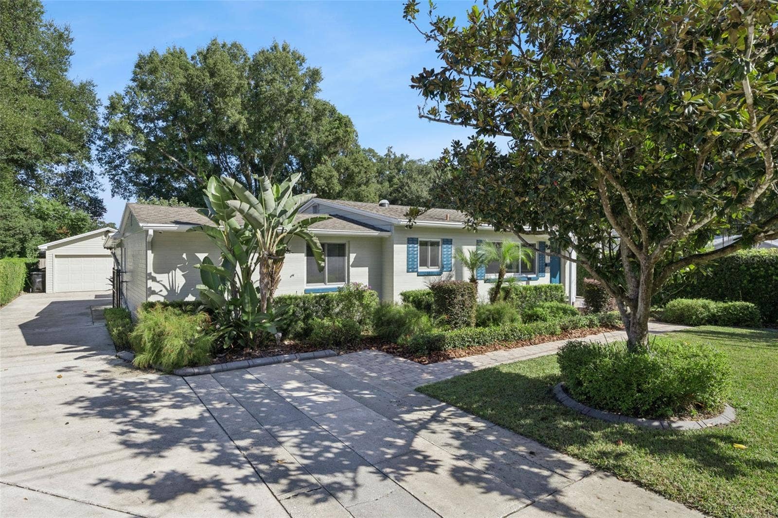 3115 HARGILL DRIVE, Orlando, FL 32806 Downtown with a extra long driveway to a 4 car tandem garage.