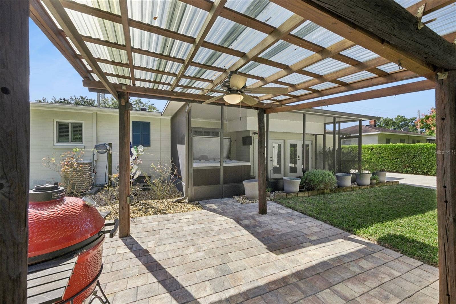 3115 HARGILL DRIVE, Orlando, FL 32806 Sturdy Gazebo for all your grills! Ceiling fan and power on a pole complete this area for your outdoor grilling needs