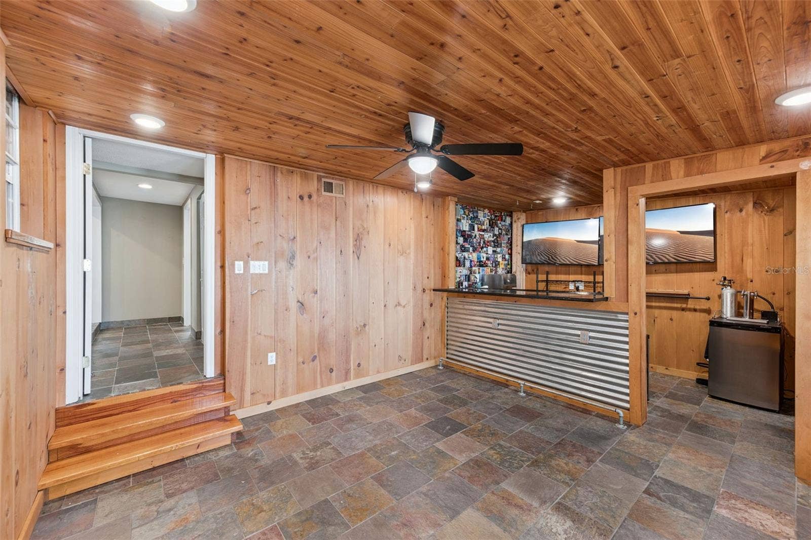 3115 HARGILL DRIVE, Orlando, FL 32806 Bonus game room / Pub / Mancave ready for your next weekend game viewing.