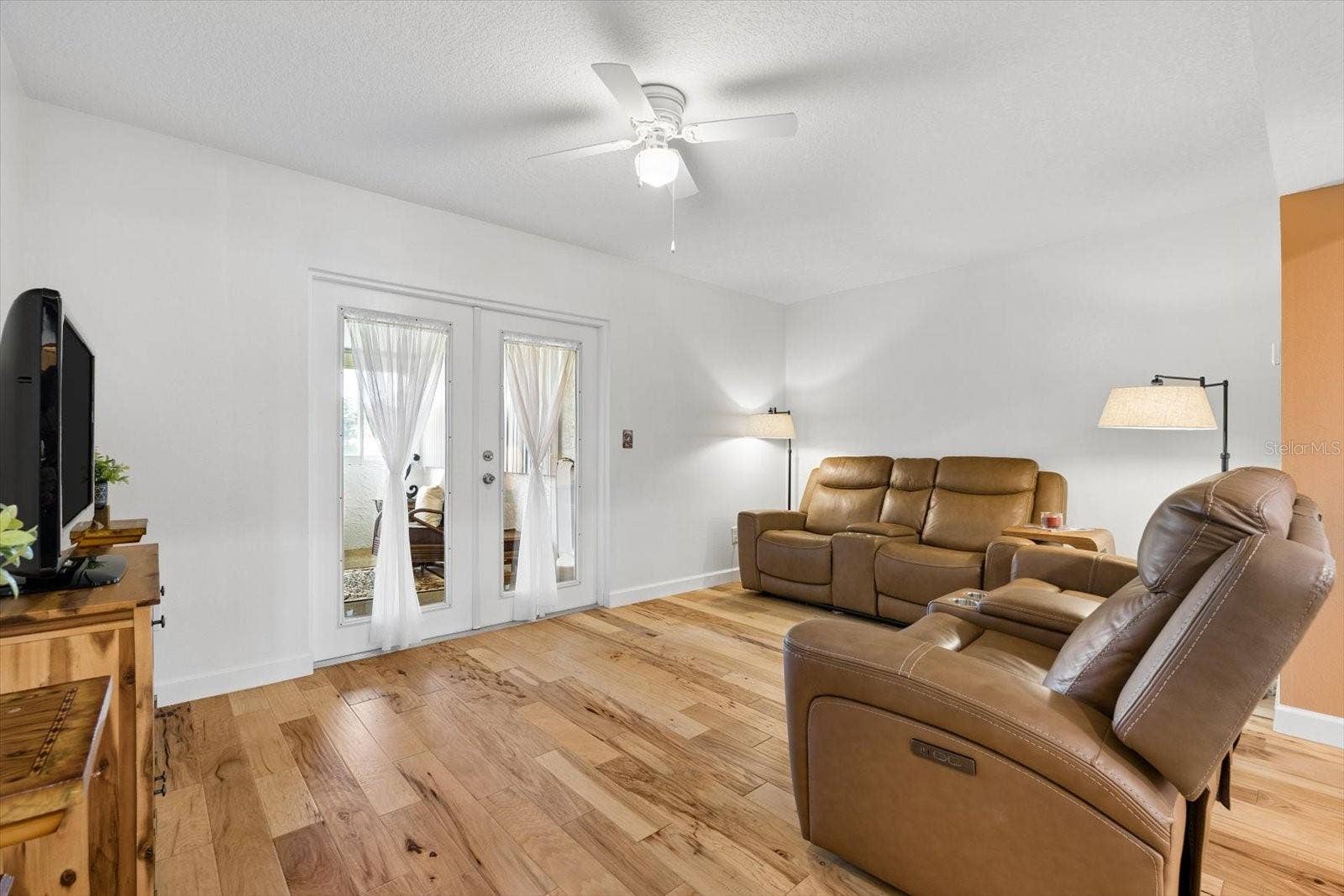 Living with French Doors to closed in porch