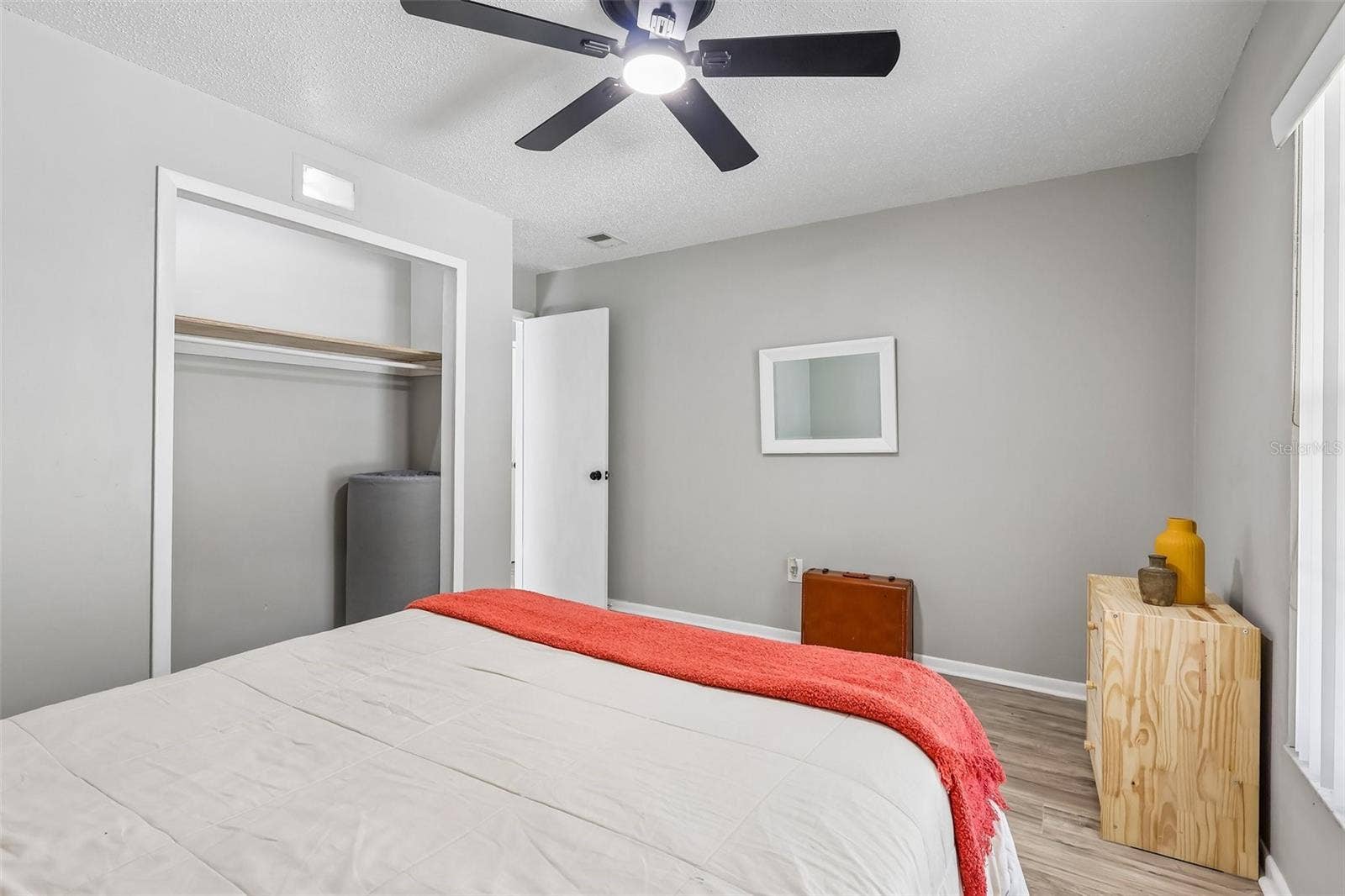 1332 BOREAS DRIVE, Orlando, FL 32822 Guest bedroom 2 features a ceiling fan and built-in closet