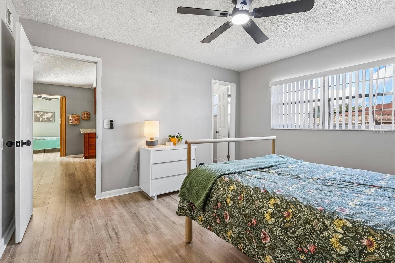 1332 BOREAS DRIVE, Orlando, FL 32822 The primary suite has a large window and an en-suite bathroom