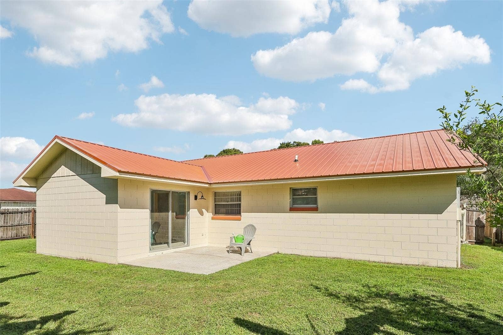 1332 BOREAS DRIVE, Orlando, FL 32822 Check out your BRAND NEW METAL ROOF and a porch ready for grilling and lounging