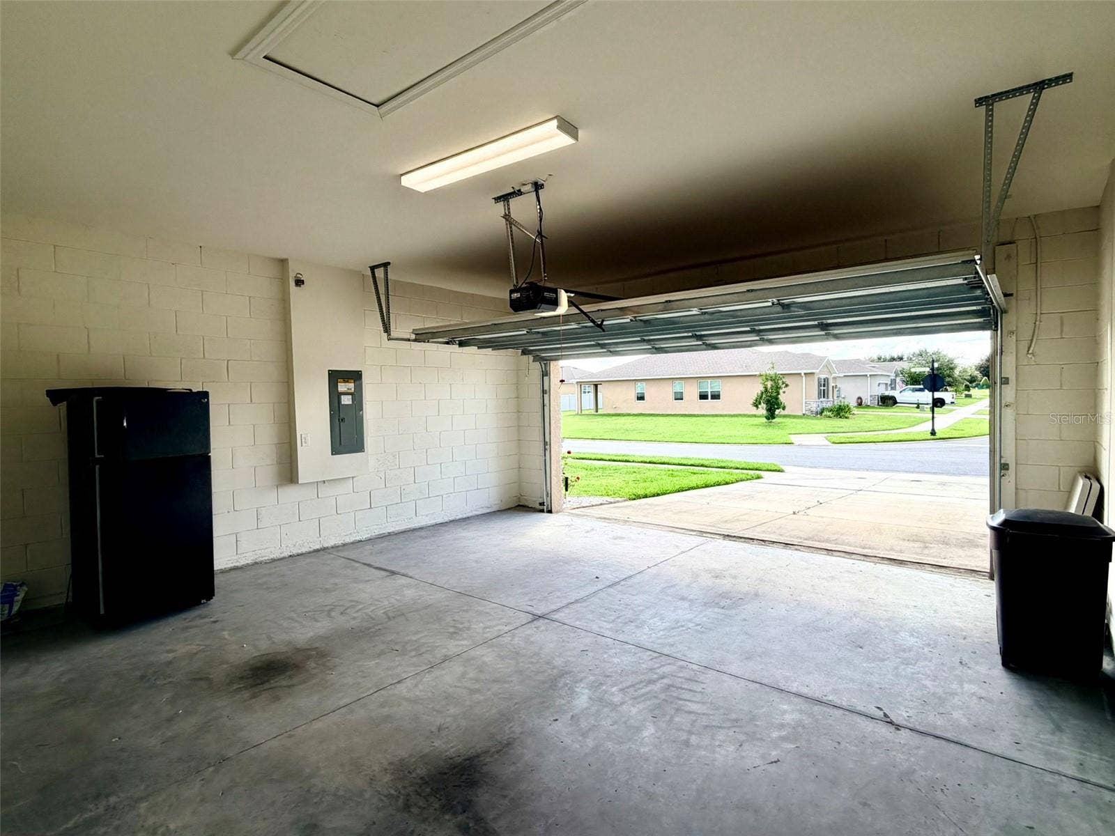 6345 SW 88TH LOOP, Ocala, FL 34476 Double garage with extra refrigerator