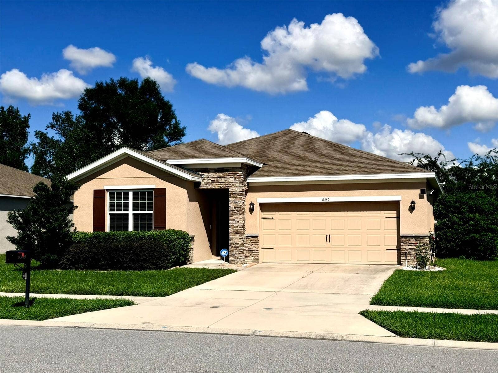 6345 SW 88TH LOOP, Ocala, FL 34476 Elevation with stone decoration
