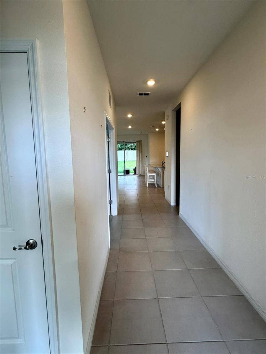 6345 SW 88TH LOOP, Ocala, FL 34476 View from the entrance towards the living room and the Lanei.