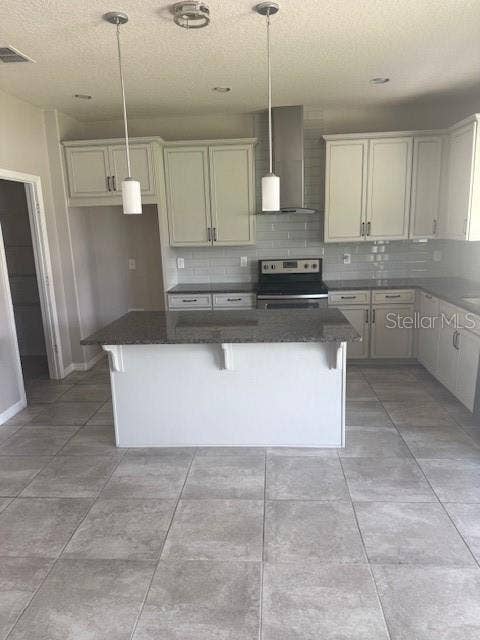 2513 ANNACELLA AVENUE, Kissimmee, FL 34741 The kitchen and island have granite countertops.