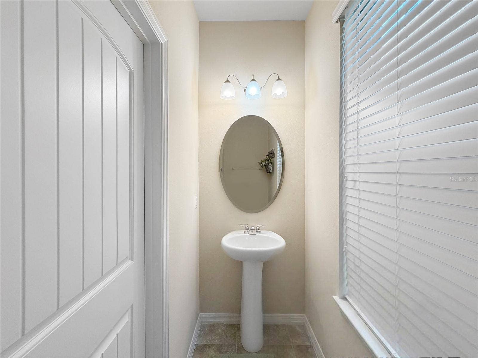9662 WATERWAY PASSAGE DRIVE, Winter Garden, FL 34787 Powder room located downstairs