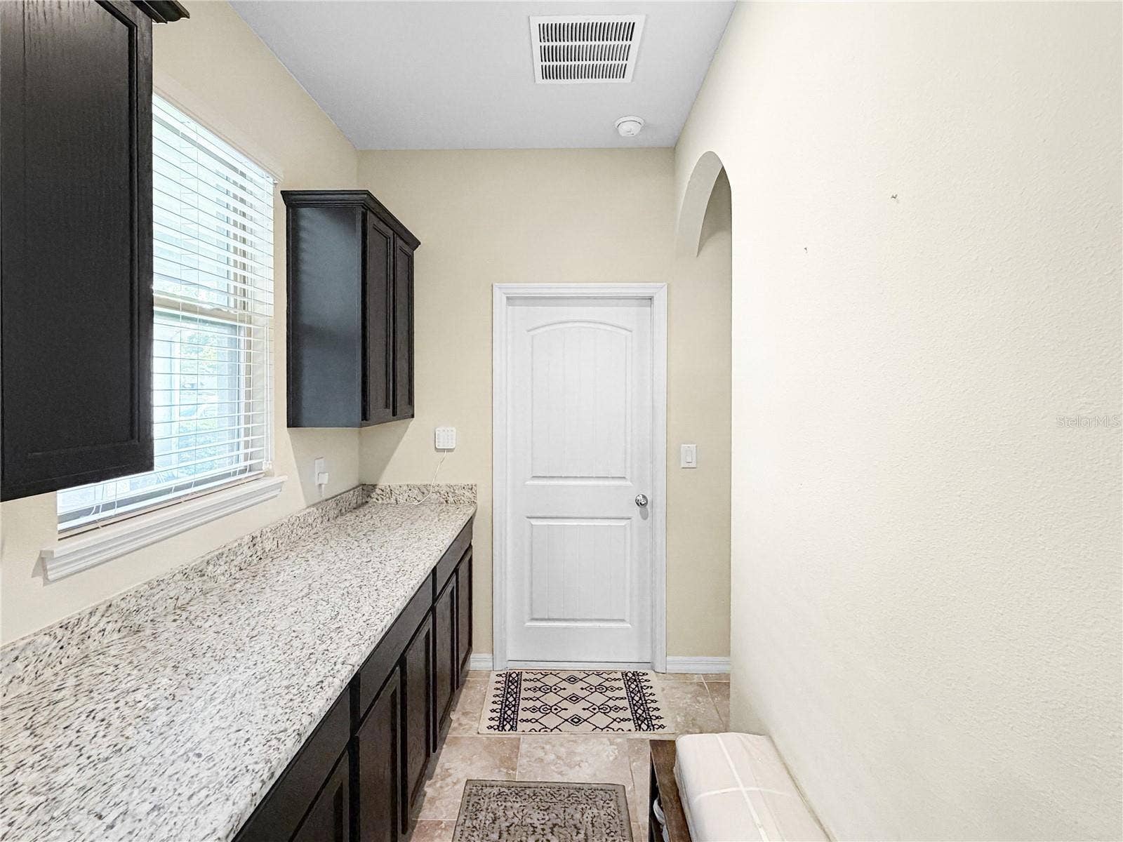 9662 WATERWAY PASSAGE DRIVE, Winter Garden, FL 34787 Drybar located off the garage entrance door