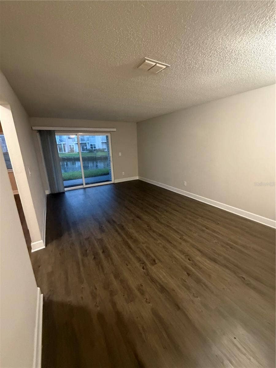 2556 WOODGATE BOULEVARD, #103, Orlando, FL 32822