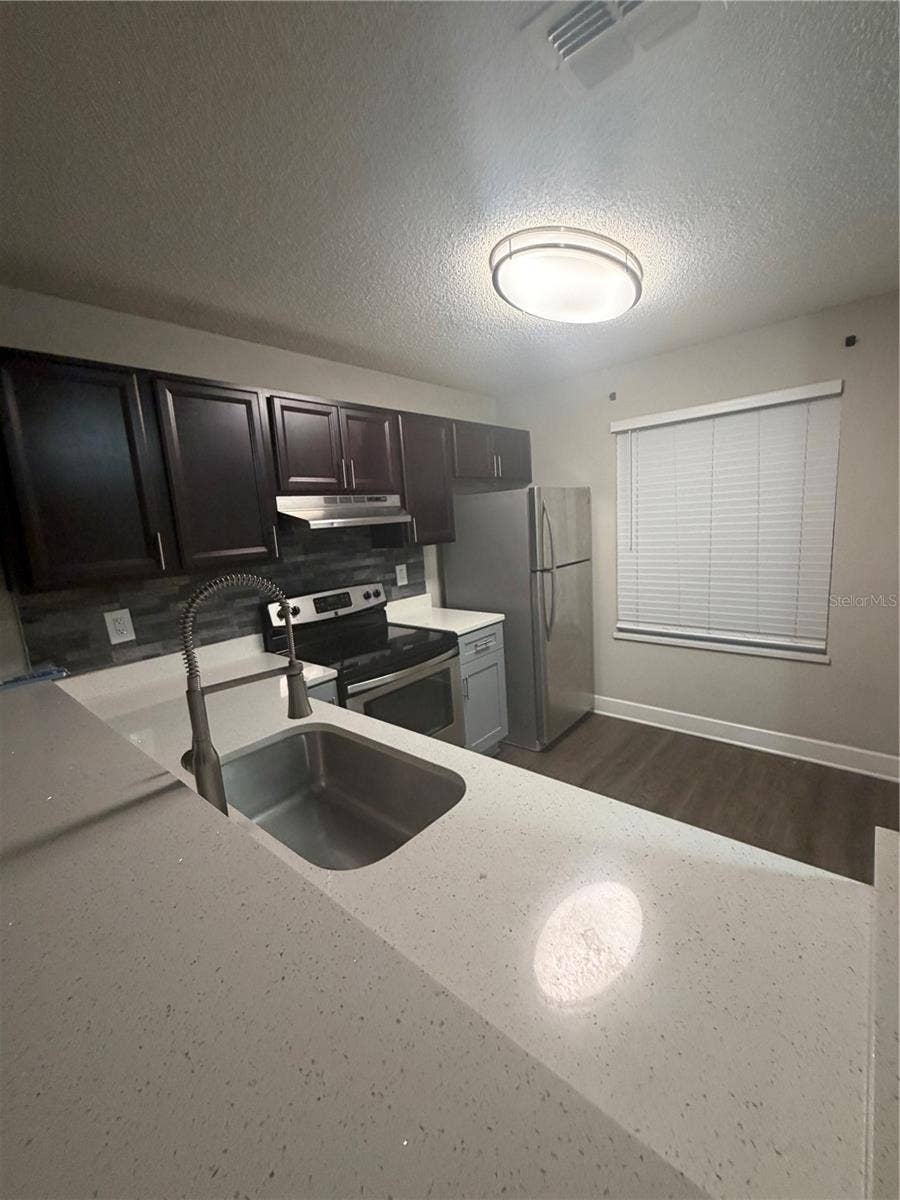 2556 WOODGATE BOULEVARD, #103, Orlando, FL 32822