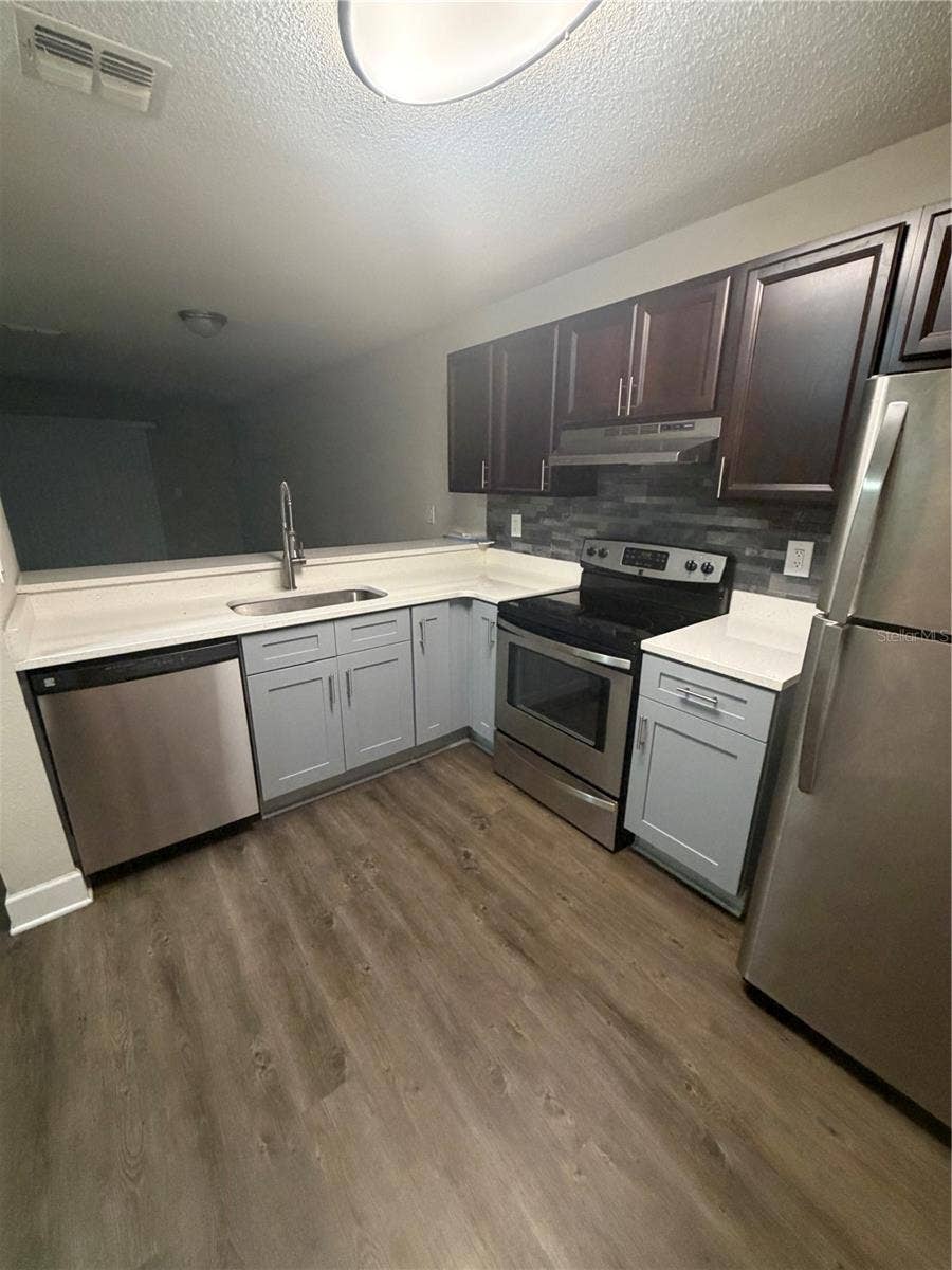 2556 WOODGATE BOULEVARD, #103, Orlando, FL 32822