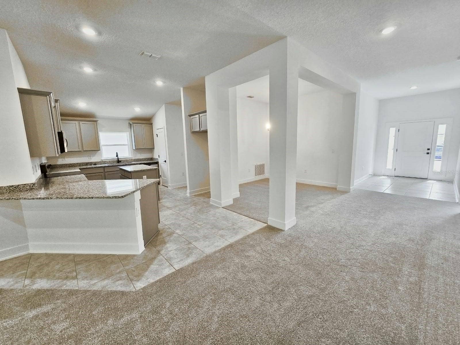 Kitchen, dining and foyer