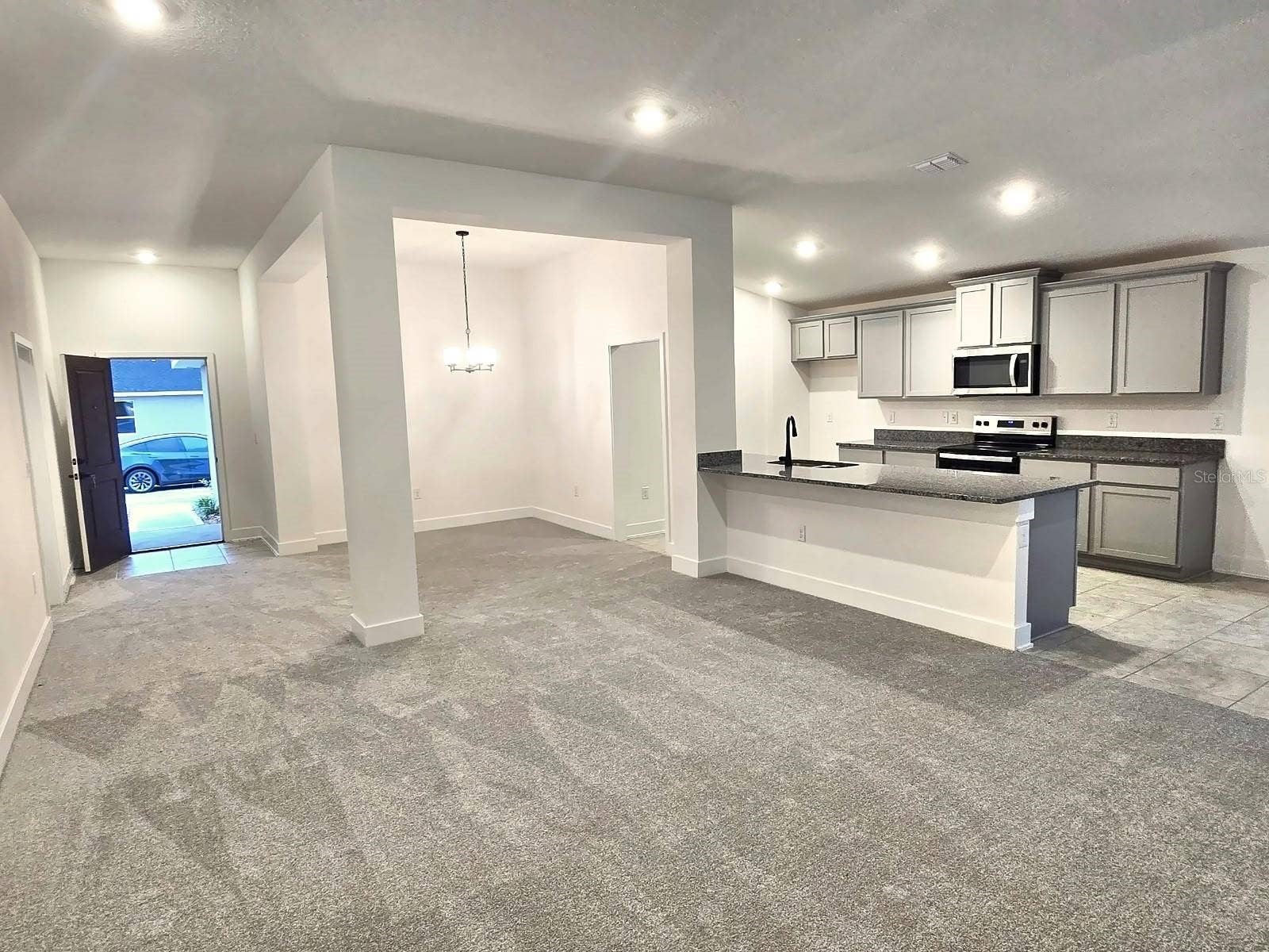 Great room, dining room and kitchen