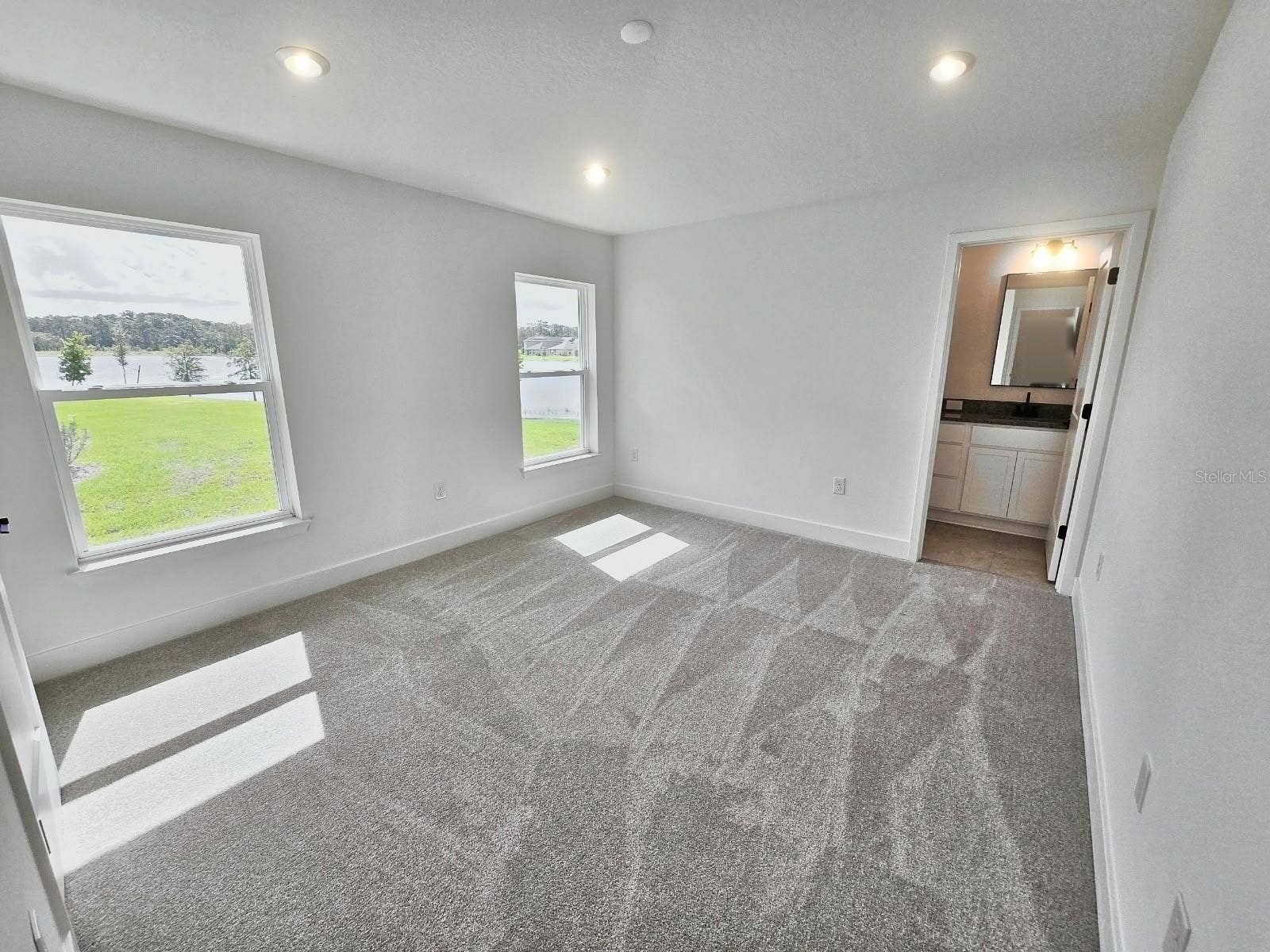 3614 BRIARLYNNE WAY, St Cloud, FL 34773 Primary bedroom with water view