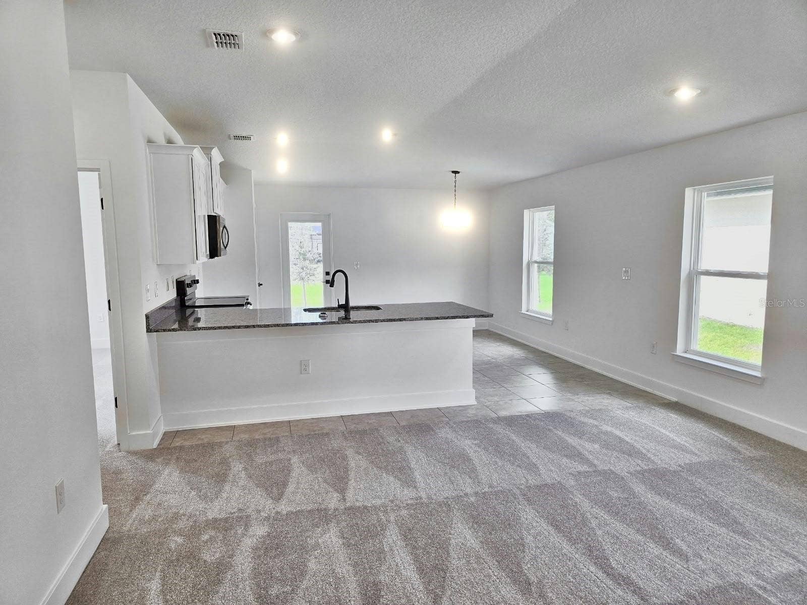 3614 BRIARLYNNE WAY, St Cloud, FL 34773 Great room, kitchen and dining area