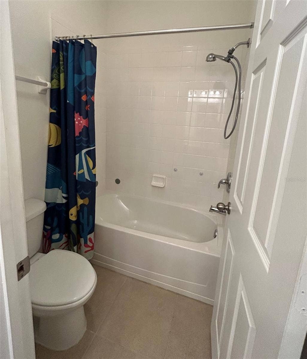 3rd Bathroom - Tub and Toilet