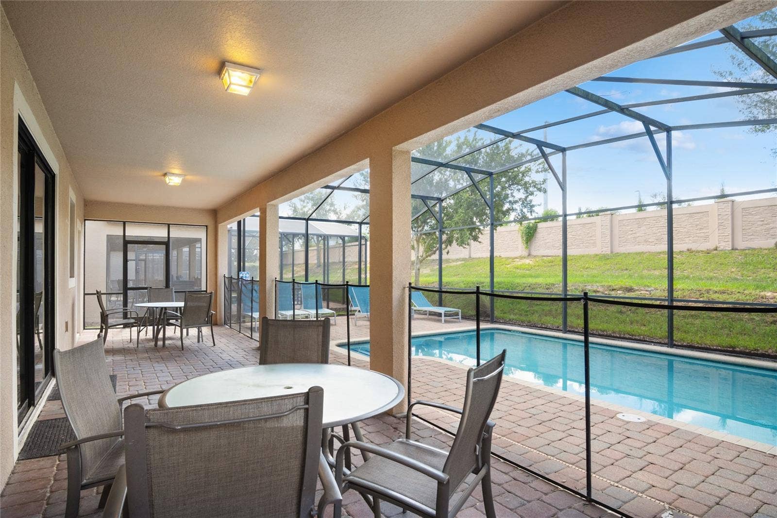 1464 MOON VALLEY DRIVE, Davenport, FL 33896 A private pool is great for enjoying time in the evening.
