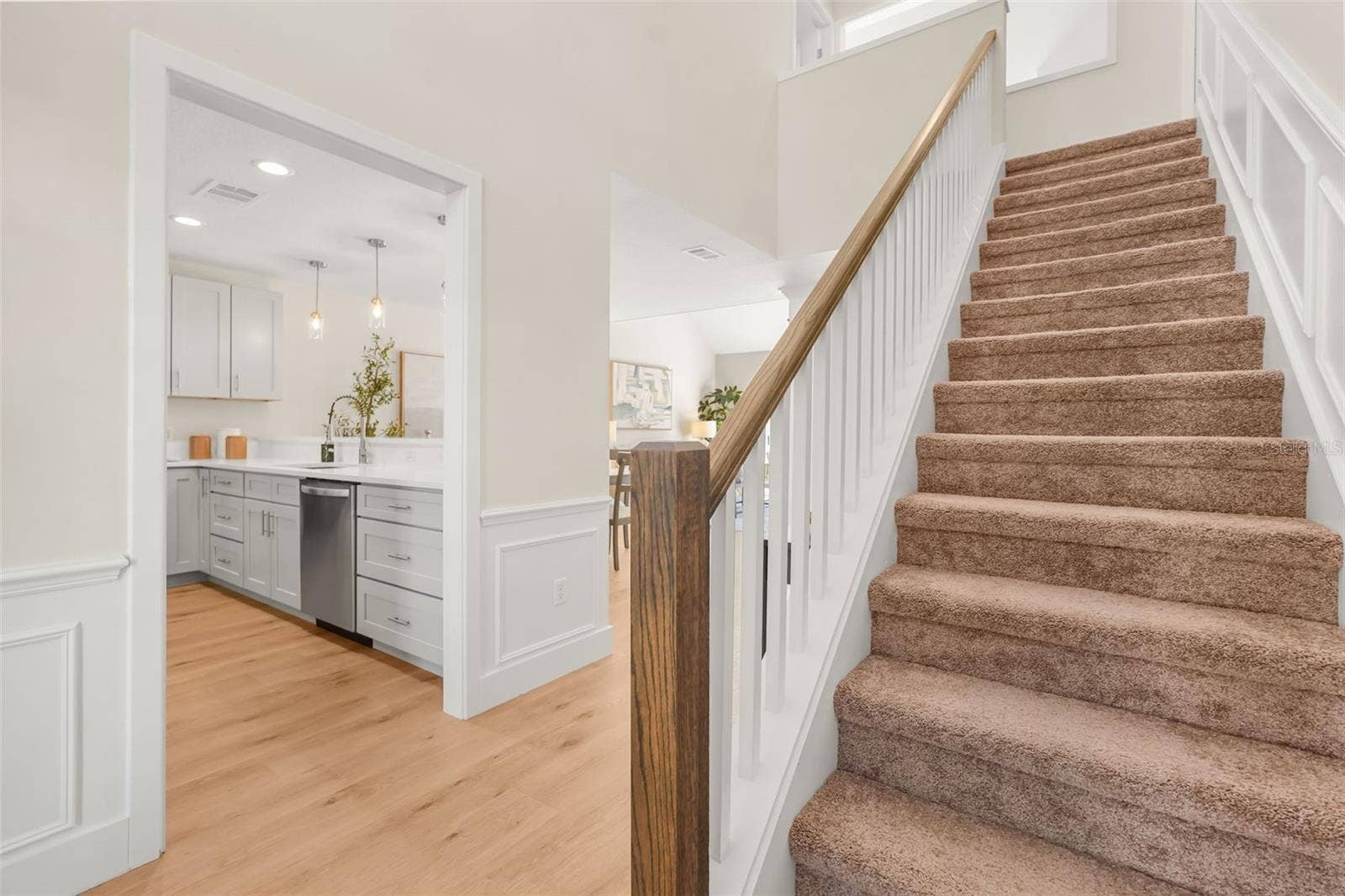 917 BERESFORD WAY, Lake Mary, FL 32746 Stairs leading to 2 guest bedrooms and a guest bathroom