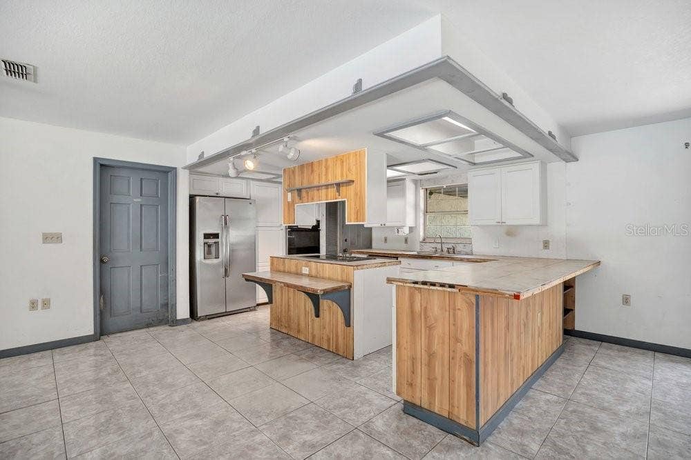 211 S GAINES STREET, Oak Hill, FL 32759