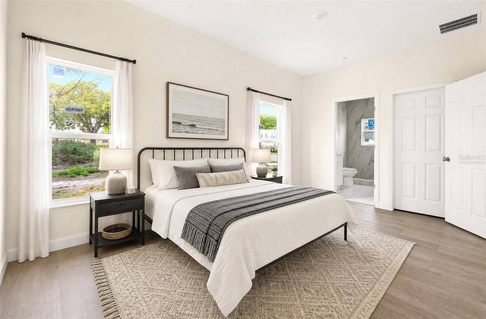 702 LUCKY STREET, Titusville, FL 32780 Light filled primary suite. Virtually Staged.
